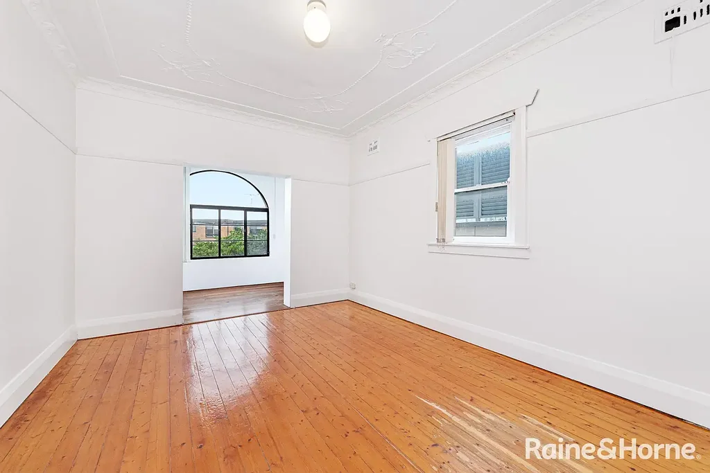 HUGE TWO BEDROOM APARTMENT WITH SUNROOM  - FRESHLY PAINTED!!