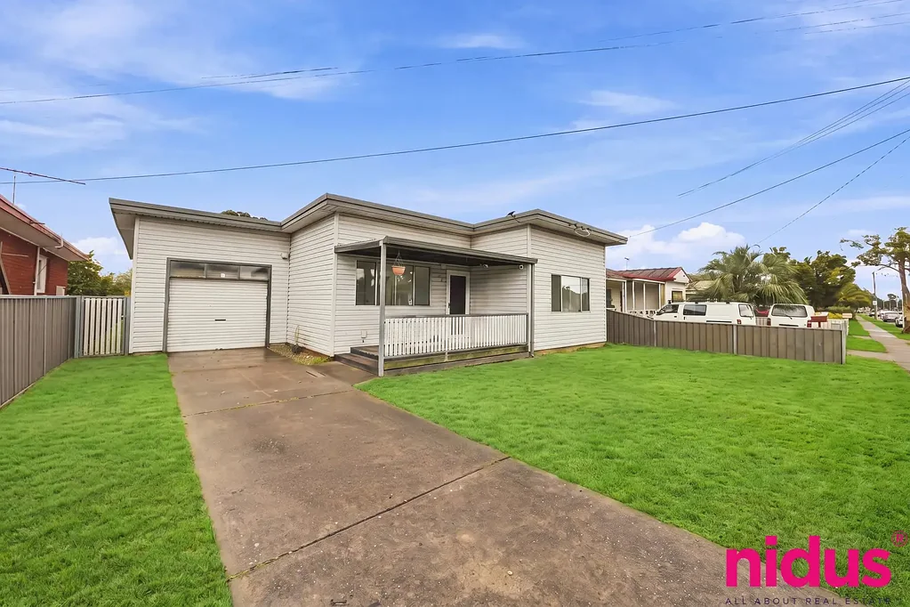 Freshly Renovated Three-Bedroom Home with Air-Conditioned Rear Retreat