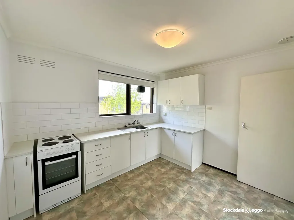 FRESHLY PAINTED & CARPETED APARTMENT WITH BALCONY