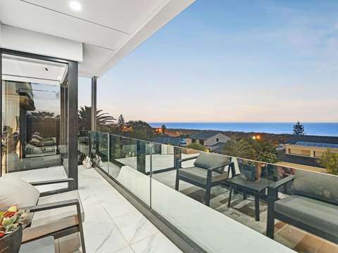 City Beach 4 Bedroom Luxurious Near New Oceanview Downsizer | Rear Garden Gate Onto Village Green | Easycare Green Title Lot With 4 Car Garage and Elevator