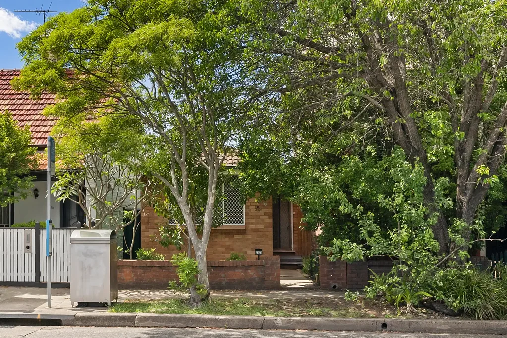 Renovated freestanding home with rear-lane access