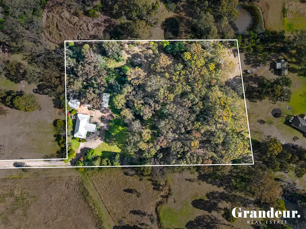 Bringelly 4غرفة نوم Acreage with Endless Potential.