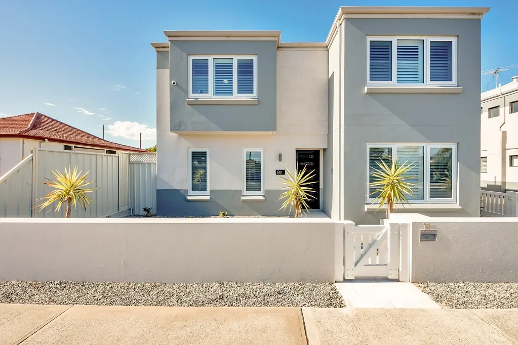 Stylish coastal townhouse in prime Palm Beach location.