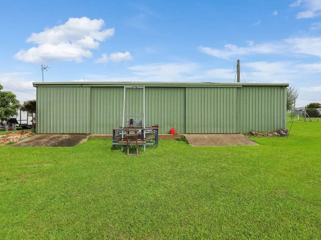Mortlake INDUSTRIAL-ZONED SHED ON OVER HALF AN ACRE