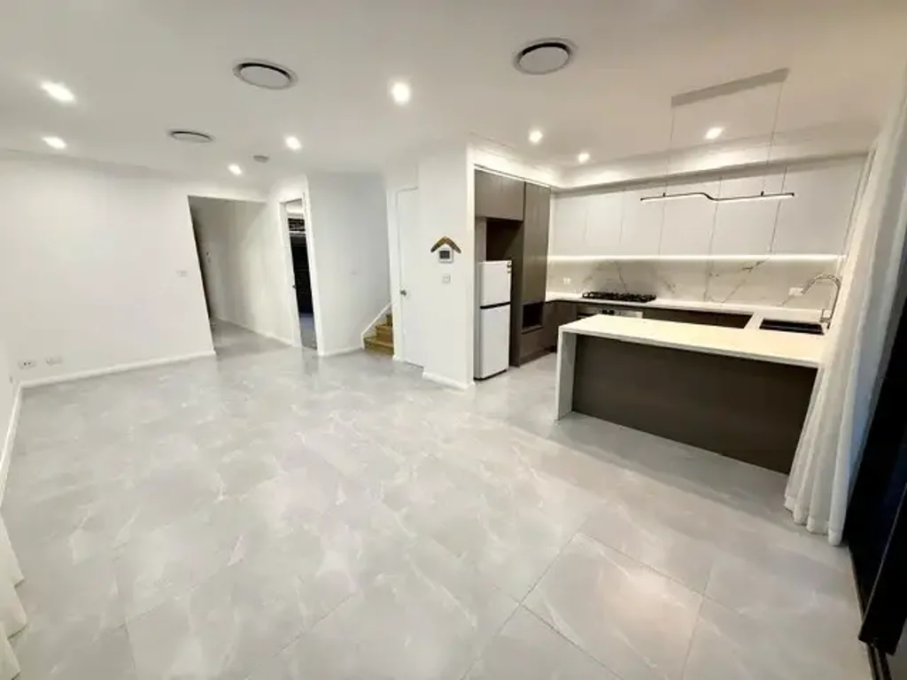 NEAR NEW MODERN DUPLEX.