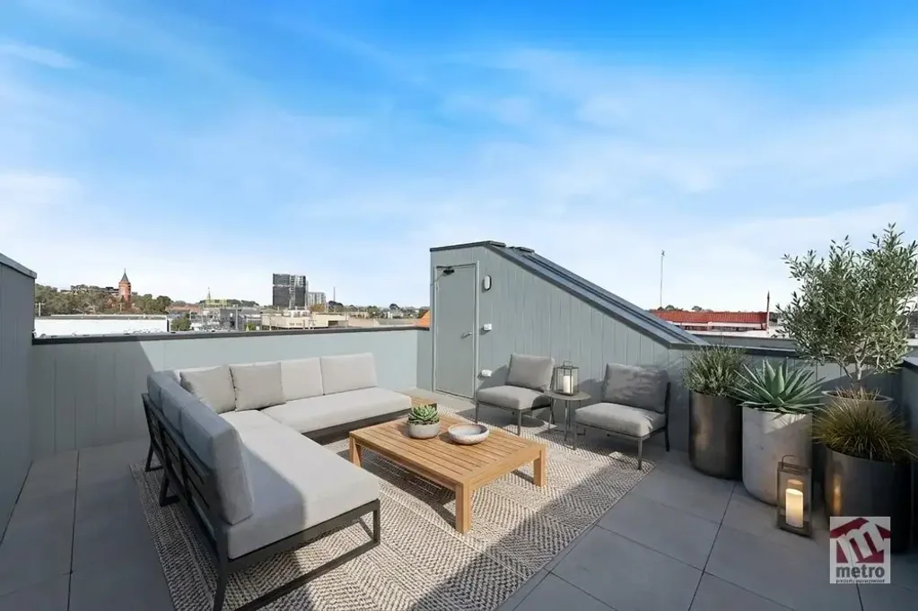 THOUGHTFULLY DESIGNED WITH PRIVATE ROOFTOP TERRACE!