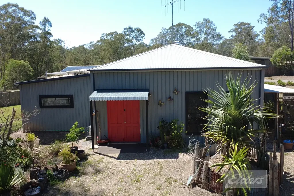 Curra Quality Small Acreage with Weekender Setup!