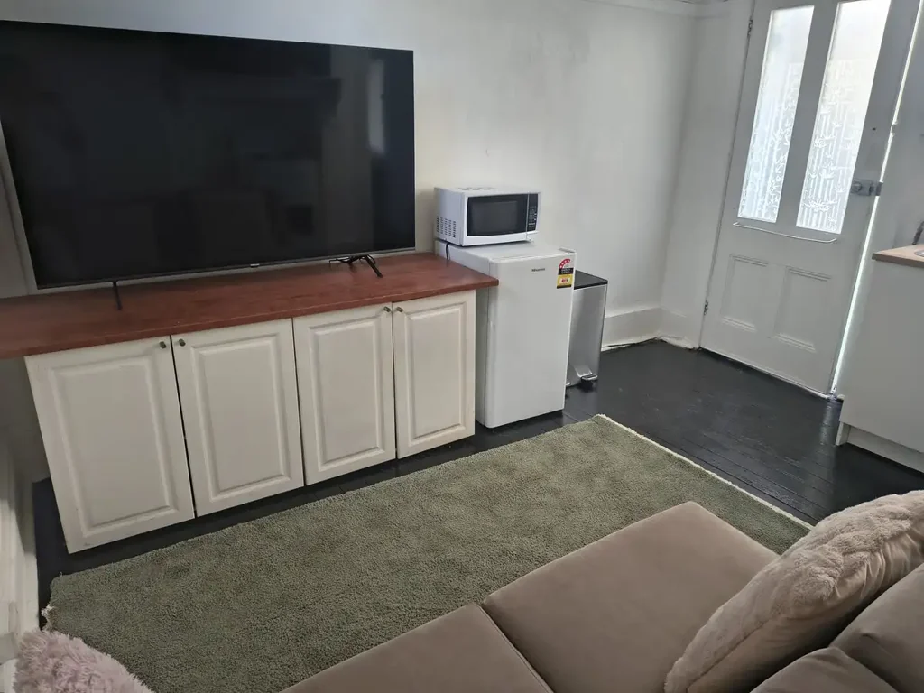 Oversized 1-Bed Studio with Separate Living in Prime Walk-to-CBD Location