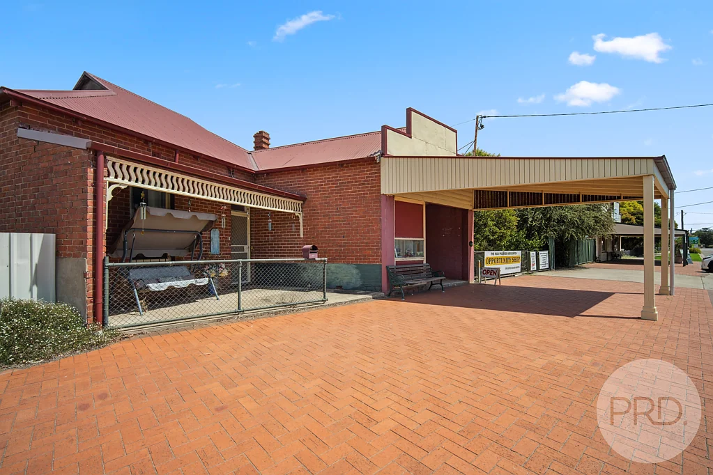 The Rock 3 Bedroom Charming 3-Bedroom Brick Home with Spacious Shop & Sheds!