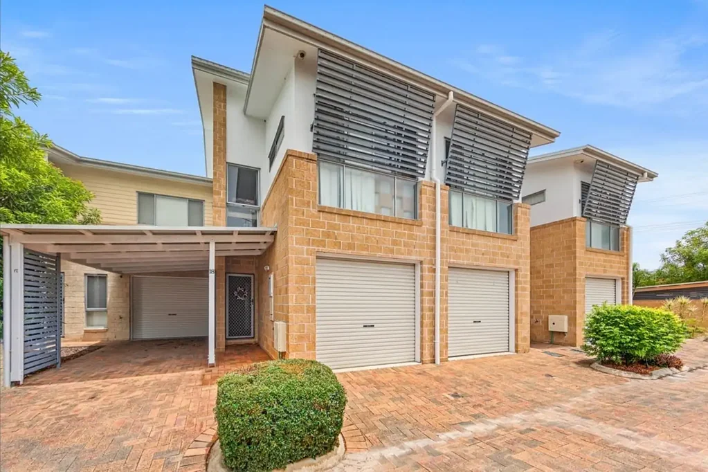 Townhouse in Secure Complex with Fresh Paint & New Carpets!