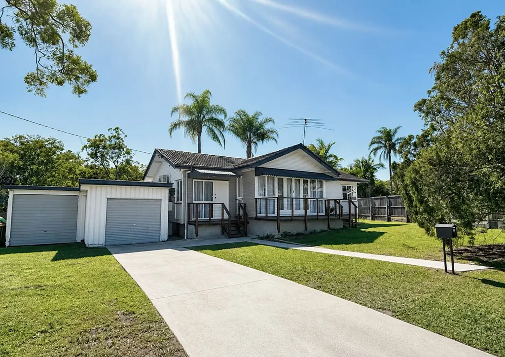 Renovated Home with Air-Conditioning, Polished Floors & Two Garages