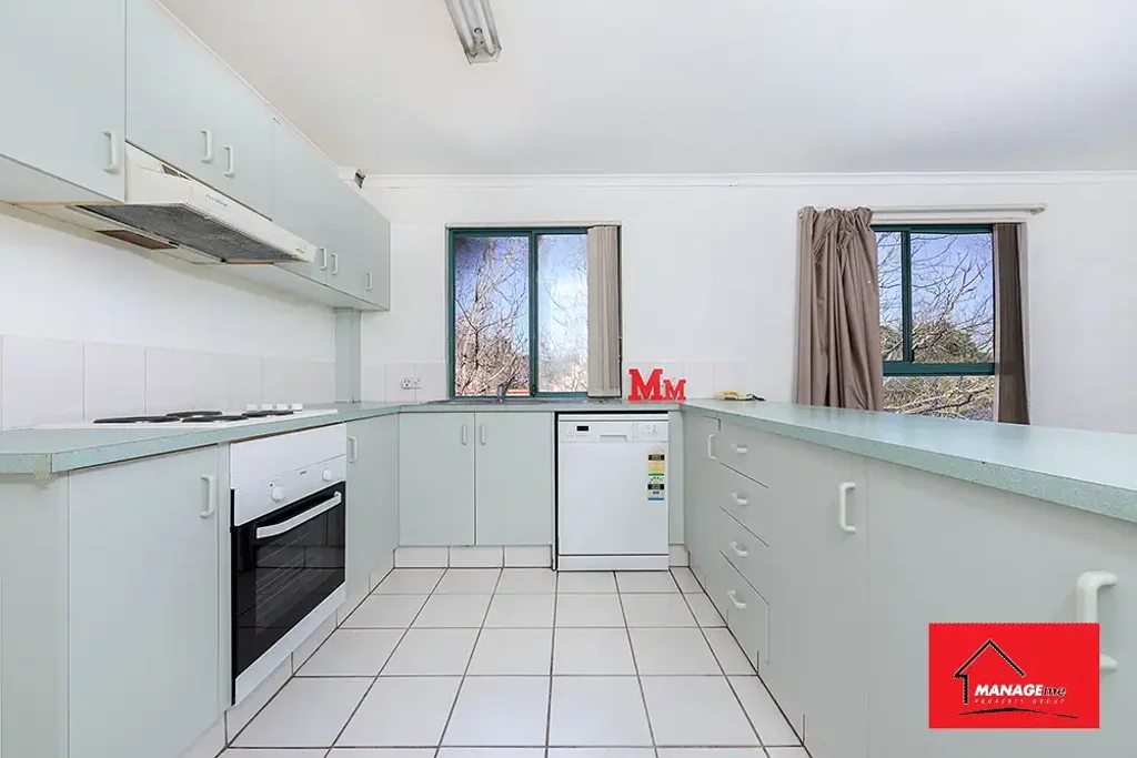 Top-Floor Living in a Prime Woden Location!