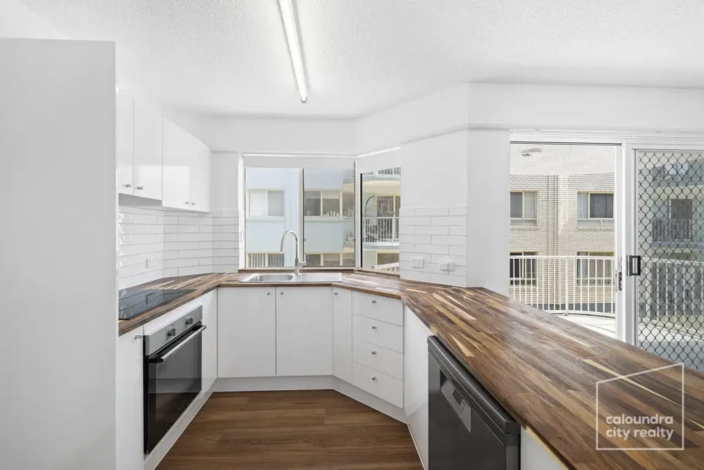 FRESHLY RENOVATED COASTAL LIVING WITH OCEAN GLIMPSES
