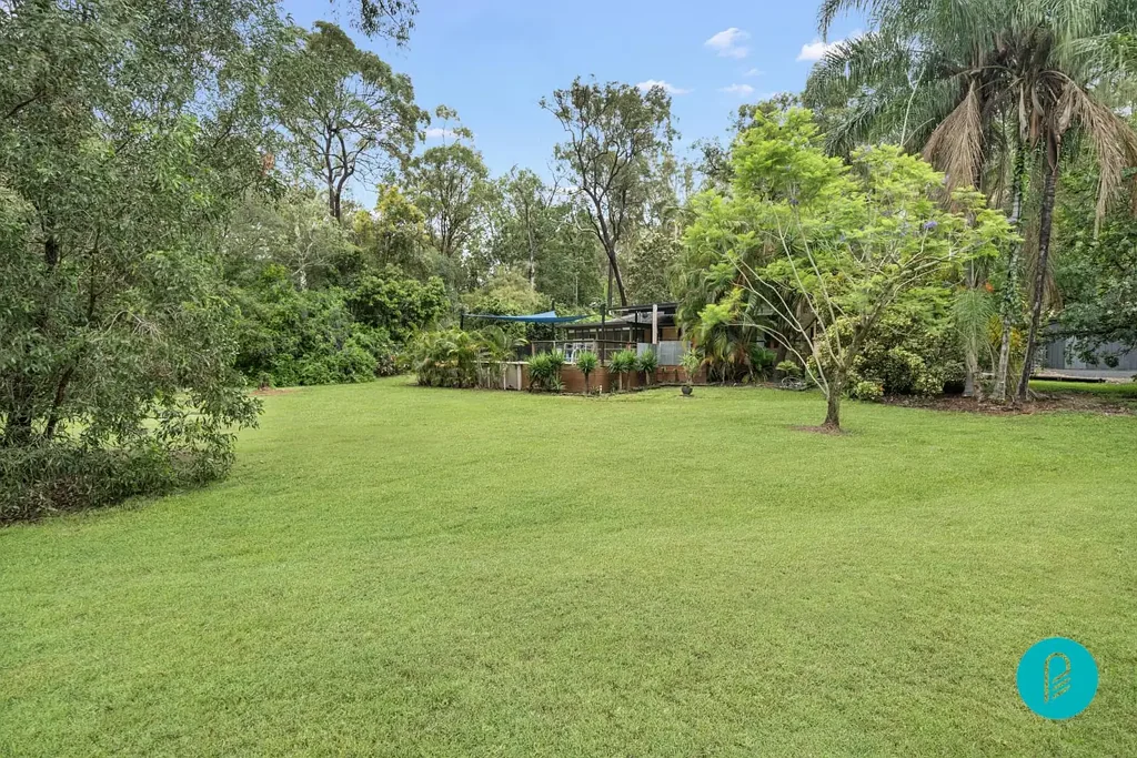 WELL-MAINTAINED FAMILY HOME ON ACREAGE W POOL