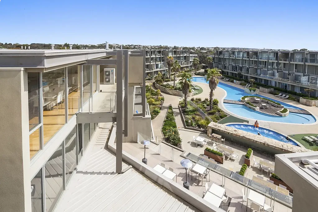 Expansive Waterfront Penthouse with Panoramic Rooftop Views