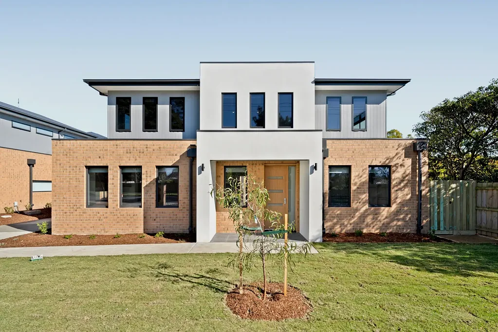 Luxe low-maintenance living in sparkling townhouse