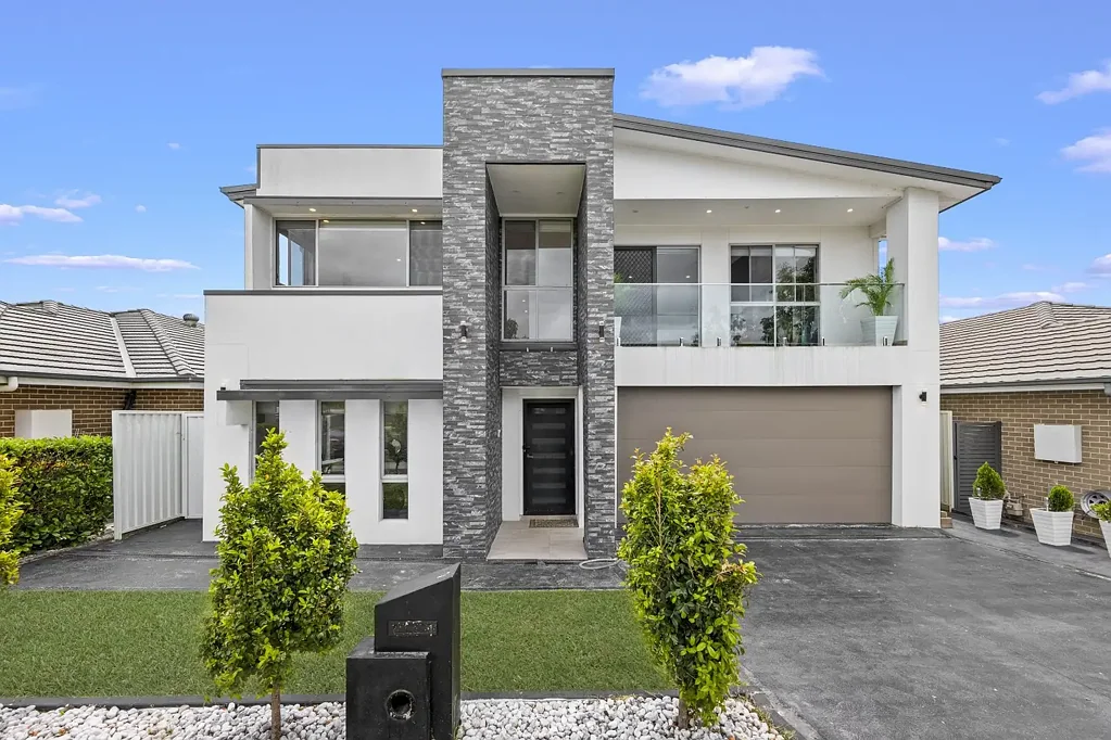 Luxury 6-Bedroom Family Home with Designer Finishes, Multiple Living Areas & Premium Location Close to Schools, Town Centre & Transport