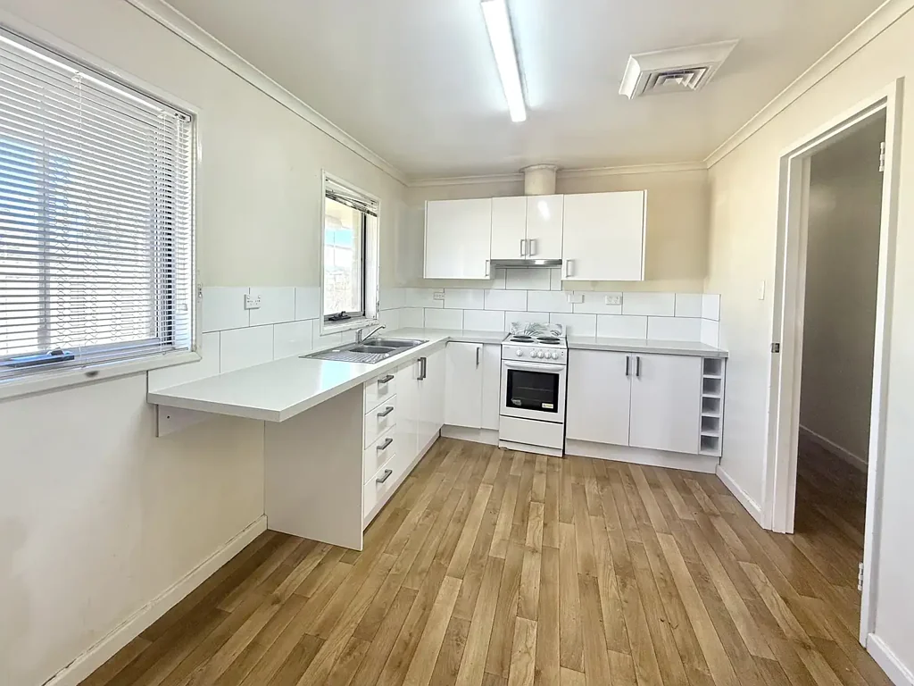 LOW MAINTENANCE FULLY FENCED HOME