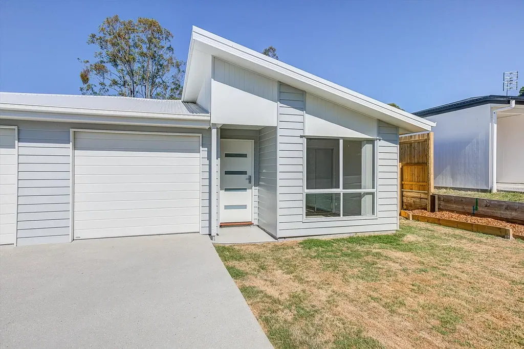 Near New Home with Large Yard and Close to Town!