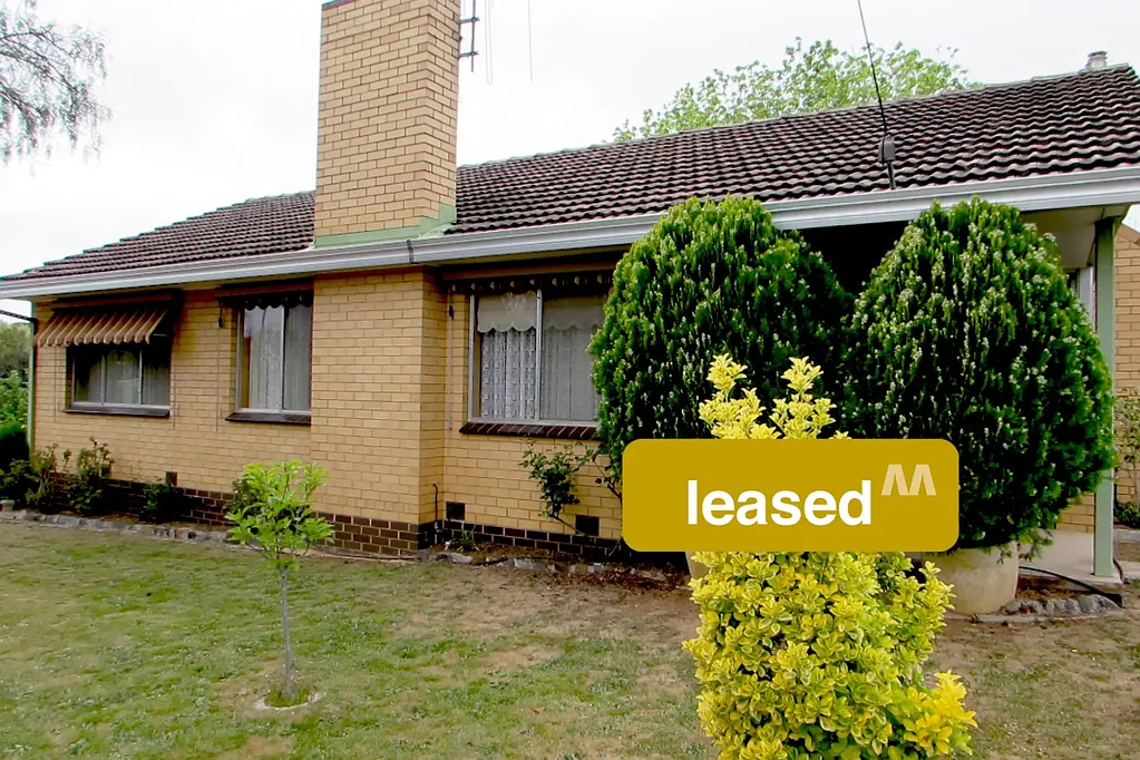 Classic Cream Brick Home Close to Town