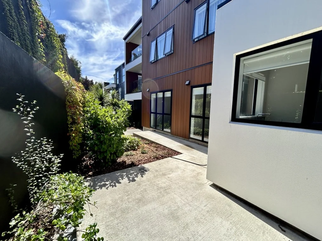 The one! Downstairs corner apartment with large patio and separate entrance