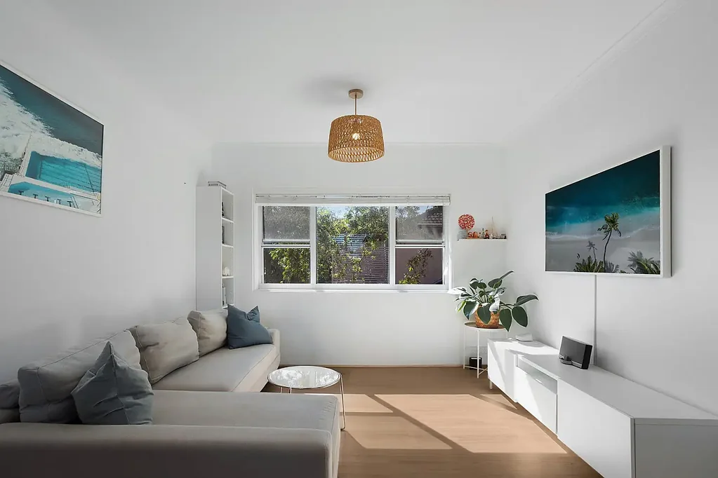 Modern Sunlit Apartment with Balcony and Garage