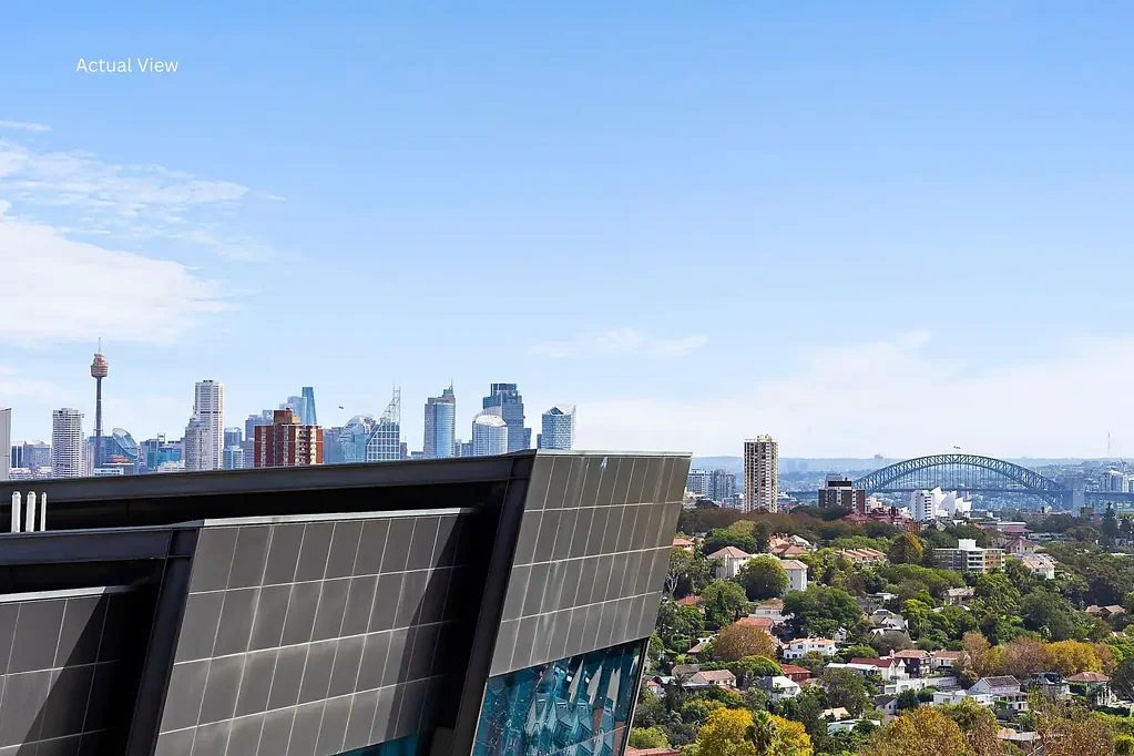 Bondi Junction 2ห้องนอน Luxuriously Appointed Executive Apartment Offers Expansive City & Harbour Views, Parking & Easy Level Access.