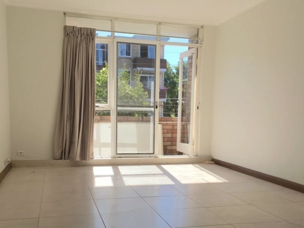 Spacious & Conveniently Located 3 Bedroom Unit with Carport