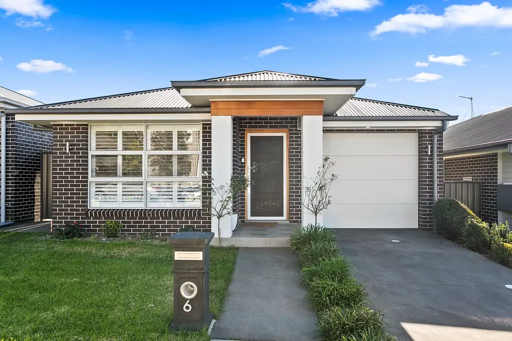 6 Coral Tree Crescent, Calderwood, NSW 2527