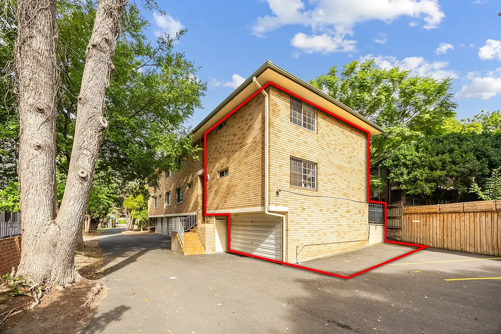 Split-Level Townhouse with Oversized Double Lock Up Garage and Additional Car Space