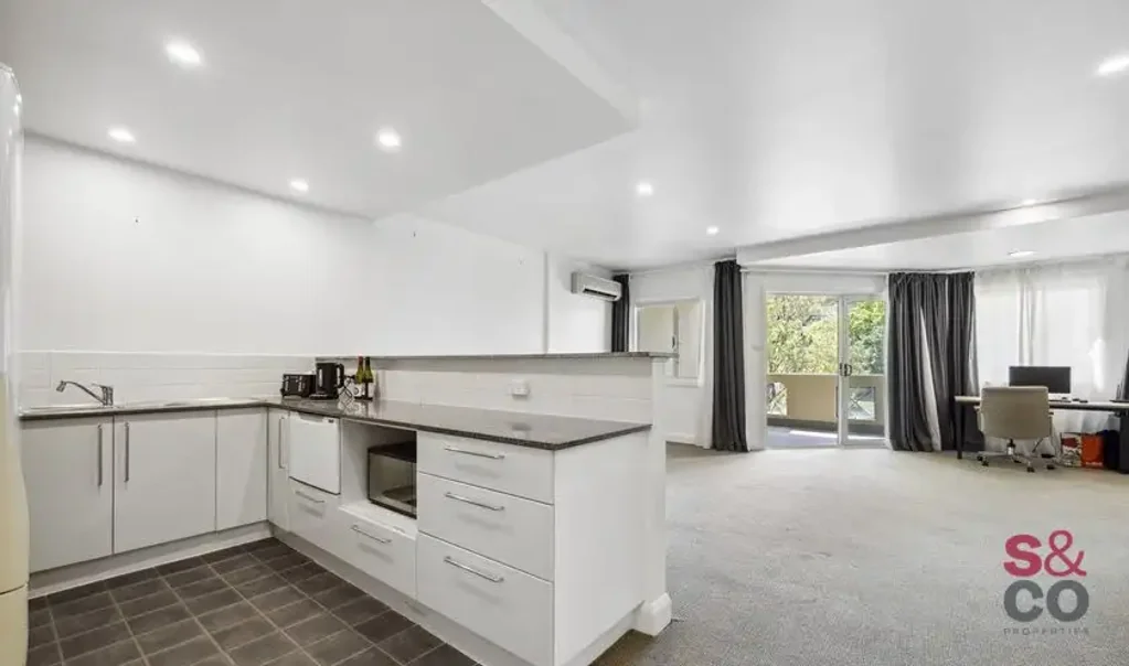 Modern Two-Bedroom Apartment with Expansive Balcony & Prime Location