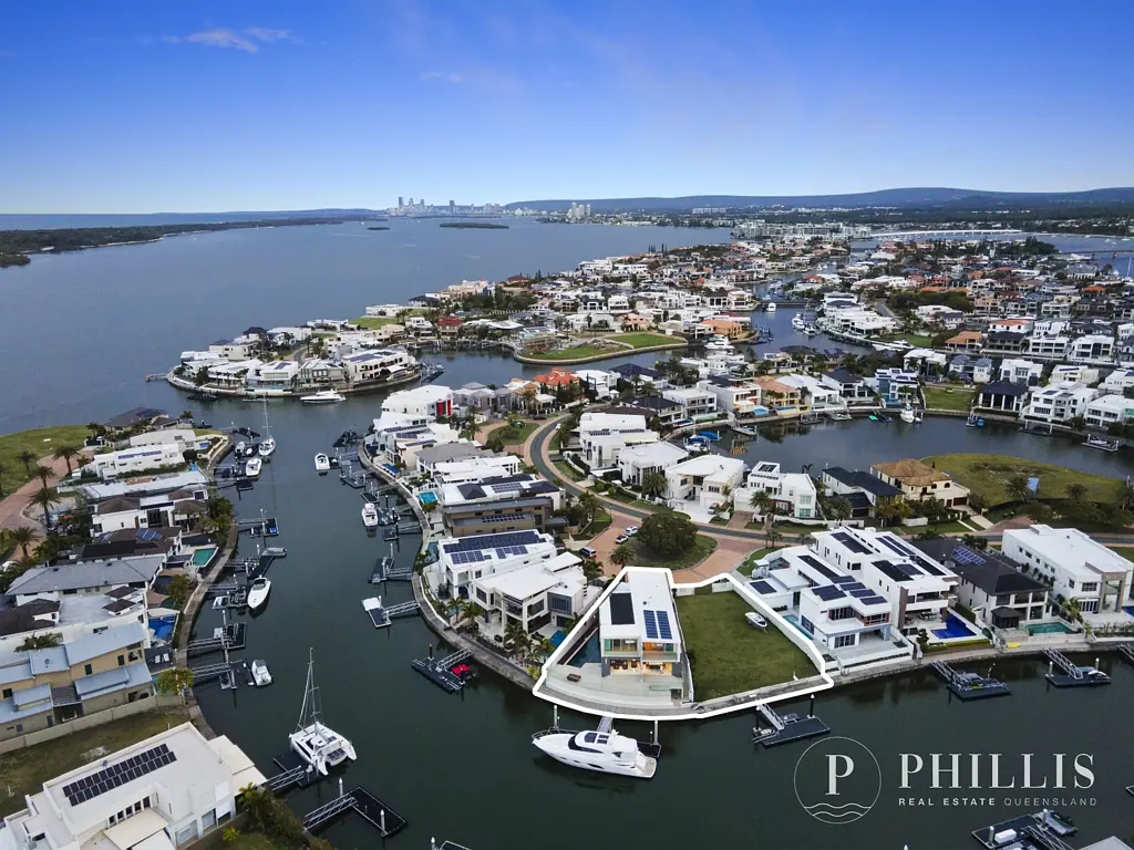 Paradise Point 5 Bedroom About to be sold! North facing, modern architecturally designed 3 level home with 8 car basement garage, wide and deep water frontage