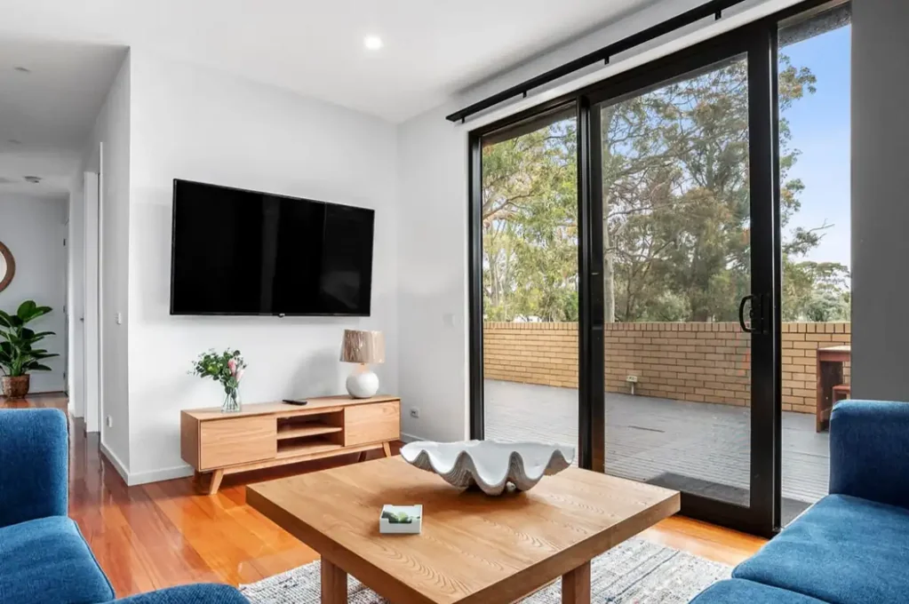 Stylish 2-Storey Townhouse with Rooftop Deck in Prime Location