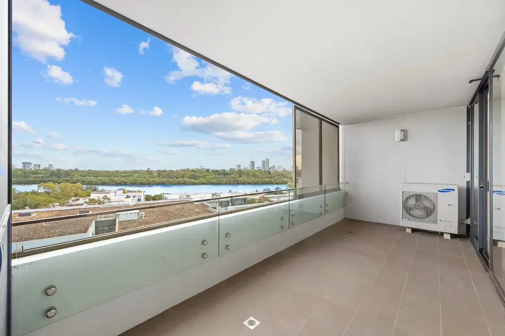 Modern Waterfront Apartment with Water Views, Study & 2 Car Spaces