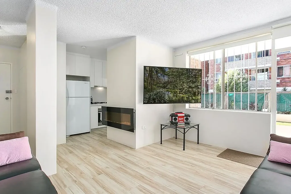 Ground Floor Unit with Private Courtyard & Lock Up Garage