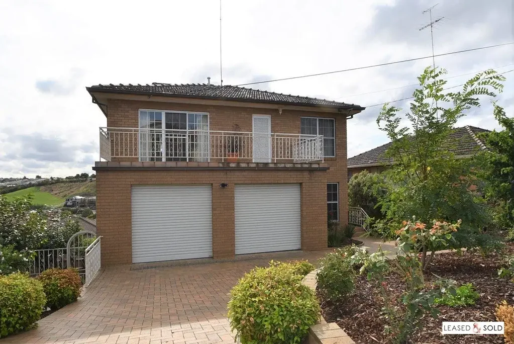 Spacious Family Living with Dual Kitchens and Versatile Lower Level