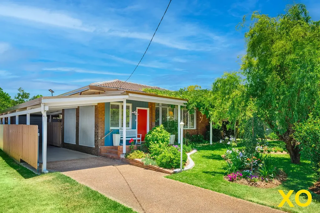 Charming Home with Flourishing Landscaped Garden