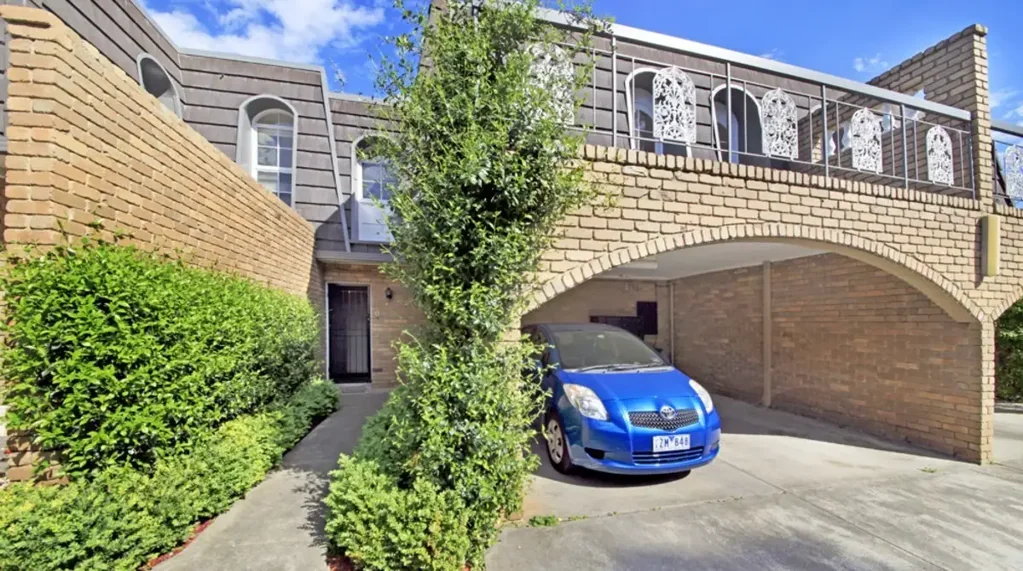 Three-Bedroom Townhouse with Terrace and Double Carport