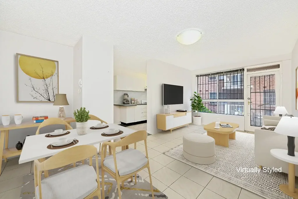THREE BEDROOM GROUND FLOOR UNIT WITH PARKING