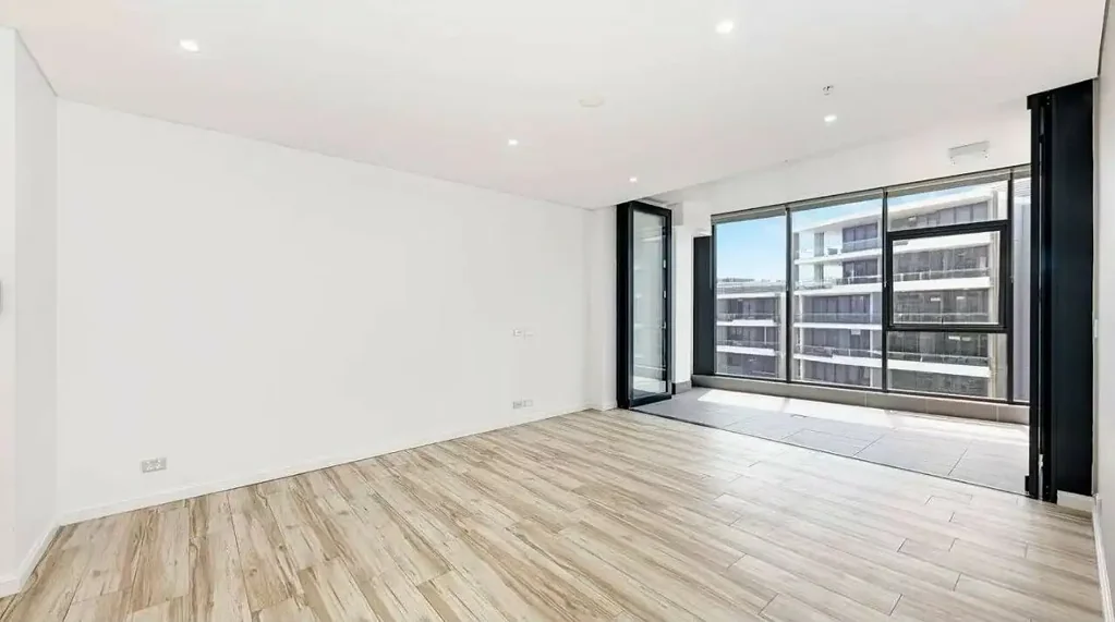A newly constructed, one-bedroom apartment with a parking space is available for rent, located near the Woolworths mascot.