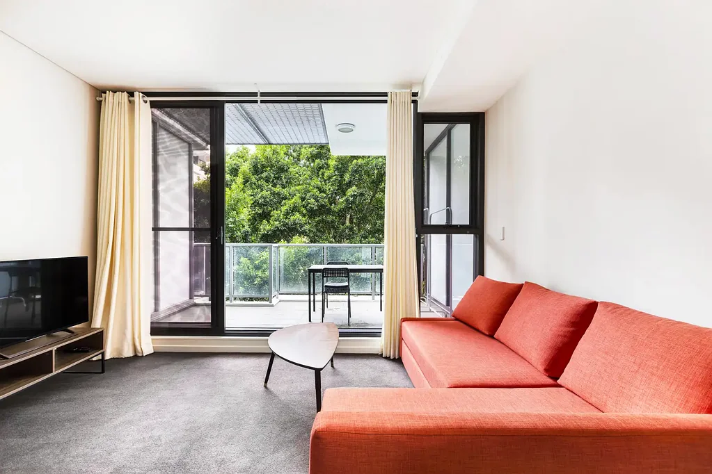One bedroom with tree views in resort-style building