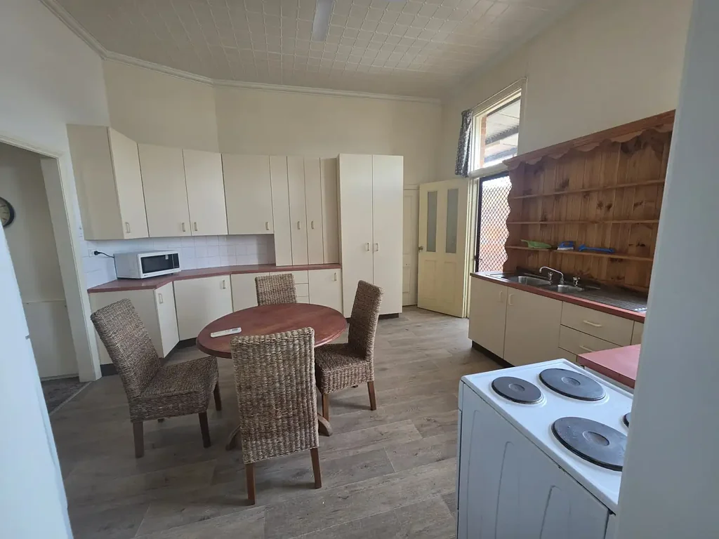 Furnished Four-Bedroom Apartment – Above Main Street,
