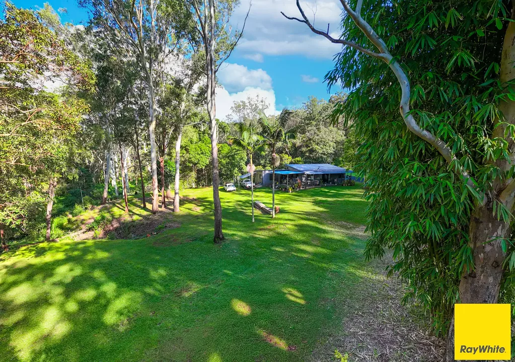 Wondecla 4房  Peaceful creekside living in a cool, elevated rural setting.