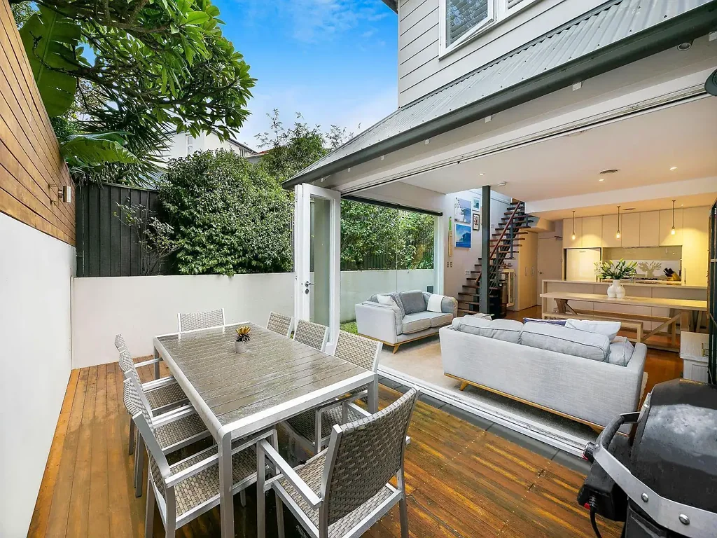 Designer beachside living in dual level apartment