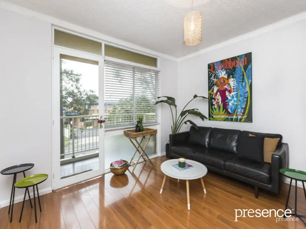 LIGHT-FILLED TWO-BEDROOM APARTMENT WITH LOCK-UP GARAGE