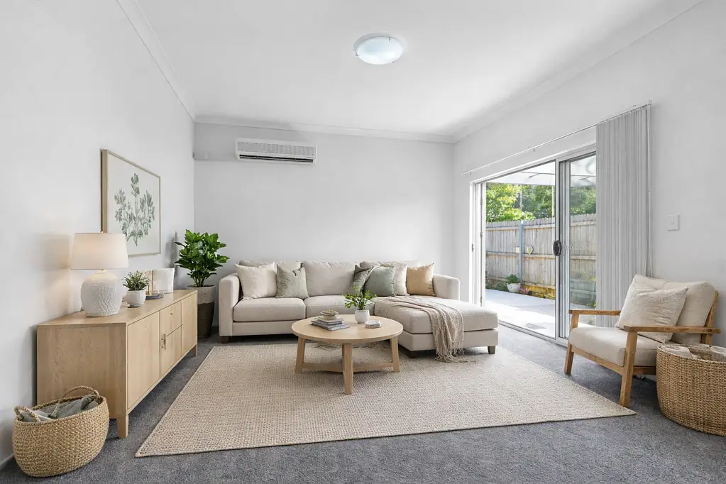 Sunlit, Spacious Living with a Private Courtyard & Transport at Your Door
