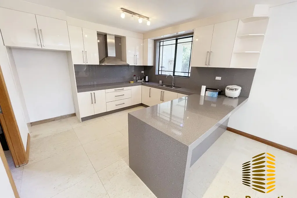 Expansive Five-Bedroom Family Home with Multiple Living Areas