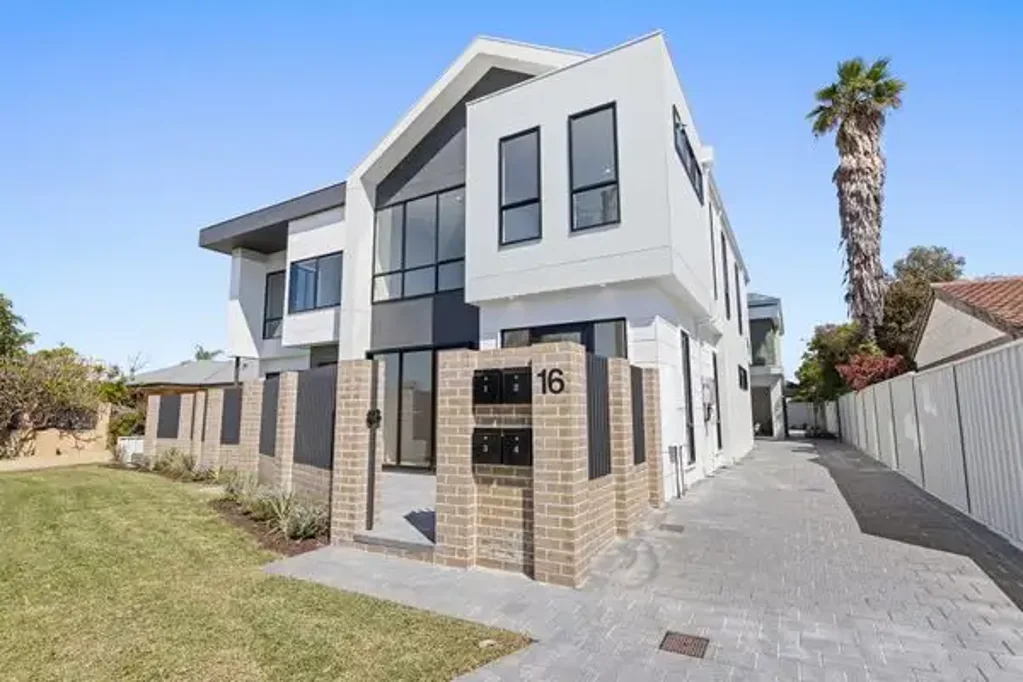 Your Dream Home: Modern Townhouse with Garage and Courtyard
