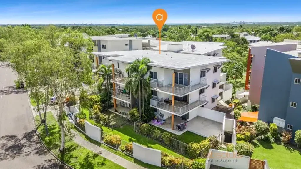 SLEEK TOP FLOOR APARTMENT WITH LIFT ACCESS & FRONT AND REAR OUTDOOR LIVING!