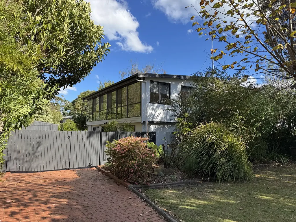 Beautifully Renovated 3-Bedroom Home with Versatile Sunroom and Large Shed